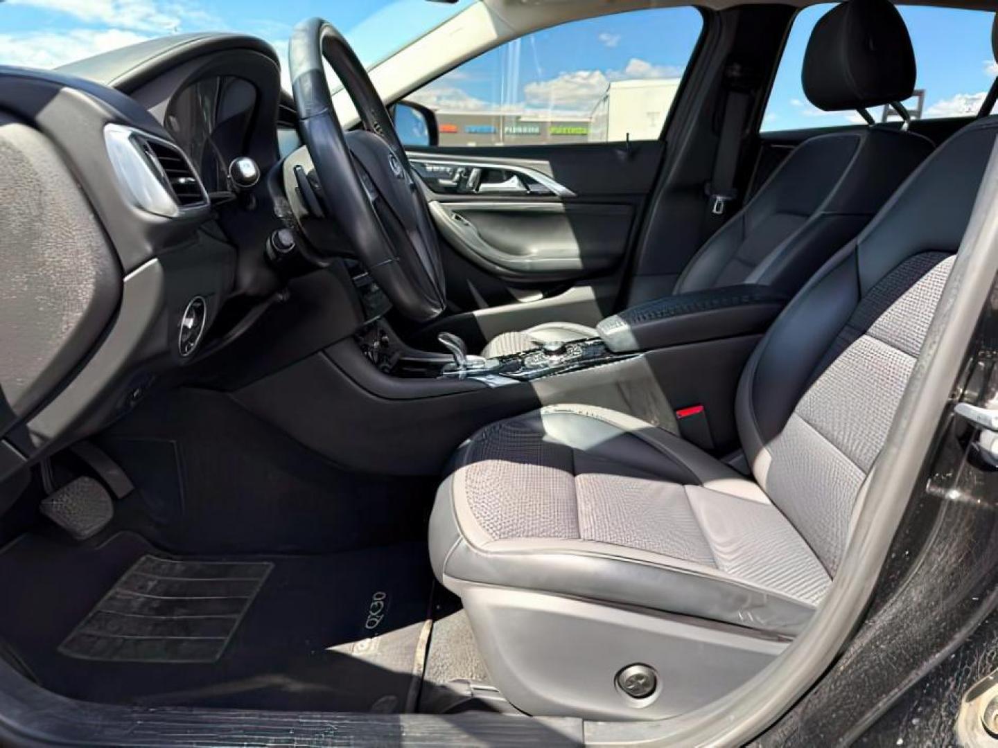 2019 Black Obsidian /Graphite Infiniti QX30 (SJKCH5CR7KA) with an 2L I-4 gasoline direct injection engine, Automatic transmission, located at 1175 N Woodruff Ave, Idaho Falls, ID, 83401, 43.506901, -111.999657 - At Timberline Auto, finding a great deal on your next vehicle is always easy! Our experienced sales staff's goal is to help find you the right vehicle at the right price! Our knowledgeable finance department has options for almost any credit score. We offer extended service contract options to prote - Photo#10