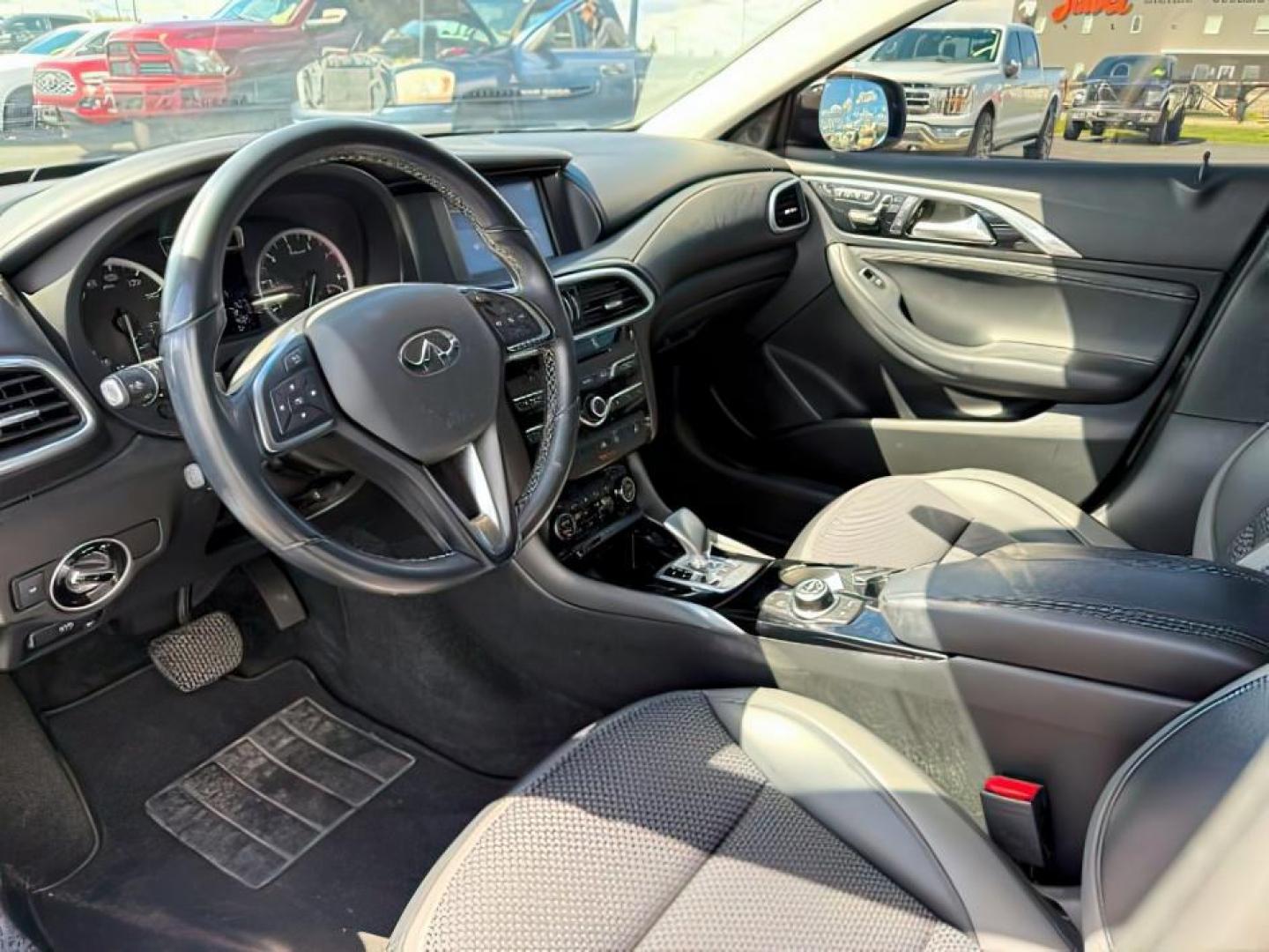 2019 Black Obsidian /Graphite Infiniti QX30 (SJKCH5CR7KA) with an 2L I-4 gasoline direct injection engine, Automatic transmission, located at 1175 N Woodruff Ave, Idaho Falls, ID, 83401, 43.506901, -111.999657 - At Timberline Auto, finding a great deal on your next vehicle is always easy! Our experienced sales staff's goal is to help find you the right vehicle at the right price! Our knowledgeable finance department has options for almost any credit score. We offer extended service contract options to prote - Photo#11
