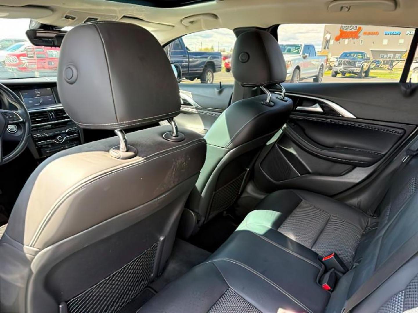 2019 Black Obsidian /Graphite Infiniti QX30 (SJKCH5CR7KA) with an 2L I-4 gasoline direct injection engine, Automatic transmission, located at 1175 N Woodruff Ave, Idaho Falls, ID, 83401, 43.506901, -111.999657 - At Timberline Auto, finding a great deal on your next vehicle is always easy! Our experienced sales staff's goal is to help find you the right vehicle at the right price! Our knowledgeable finance department has options for almost any credit score. We offer extended service contract options to prote - Photo#20