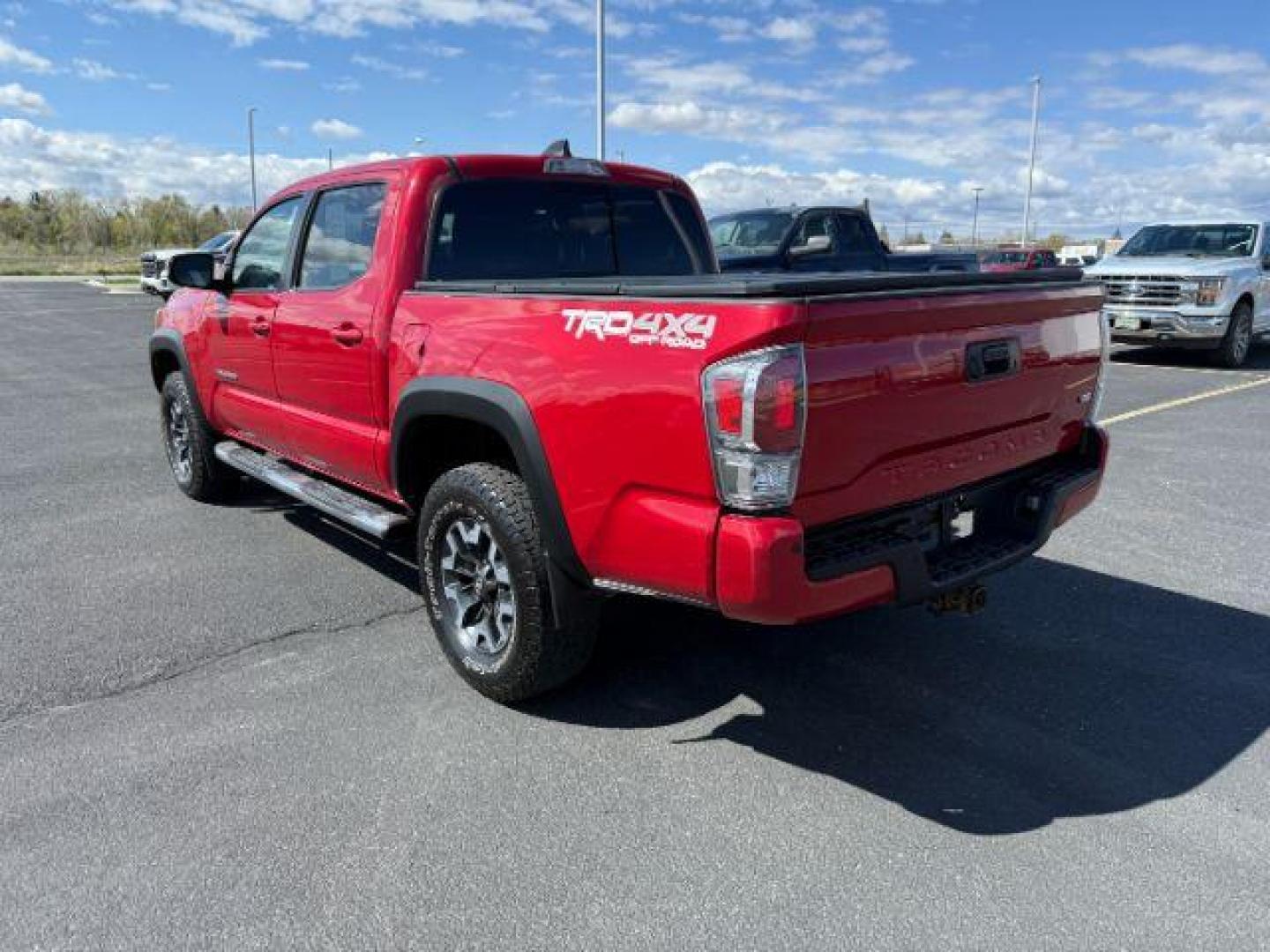 2021 Barcelona Red Metallic /Black/Gun Metal Toyota Tacoma 4WD TRD Off Road (3TMCZ5AN1MM) with an 3.5L V-6 port/direct injection engine, AUTOMATIC transmission, located at 1235 N Woodruff Ave., Idaho Falls, 83401, (208) 523-1053, 43.507172, -112.000488 - At Timberline Auto, finding a great deal on your next vehicle is always easy! Our experienced sales staff's goal is to help find you the right vehicle at the right price! Our knowledgeable finance department has options for almost any credit score. We offer extended service contract options to prote - Photo#2