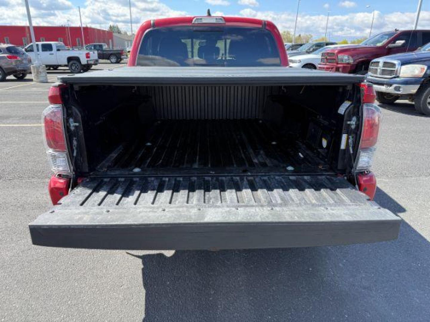2021 Barcelona Red Metallic /Black/Gun Metal Toyota Tacoma 4WD TRD Off Road (3TMCZ5AN1MM) with an 3.5L V-6 port/direct injection engine, AUTOMATIC transmission, located at 1235 N Woodruff Ave., Idaho Falls, 83401, (208) 523-1053, 43.507172, -112.000488 - At Timberline Auto, finding a great deal on your next vehicle is always easy! Our experienced sales staff's goal is to help find you the right vehicle at the right price! Our knowledgeable finance department has options for almost any credit score. We offer extended service contract options to prote - Photo#5