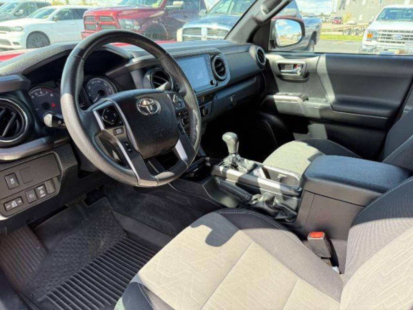 2021 Barcelona Red Metallic /Black/Gun Metal Toyota Tacoma 4WD TRD Off Road (3TMCZ5AN1MM) with an 3.5L V-6 port/direct injection engine, AUTOMATIC transmission, located at 1235 N Woodruff Ave., Idaho Falls, 83401, (208) 523-1053, 43.507172, -112.000488 - At Timberline Auto, finding a great deal on your next vehicle is always easy! Our experienced sales staff's goal is to help find you the right vehicle at the right price! Our knowledgeable finance department has options for almost any credit score. We offer extended service contract options to prote - Photo#11