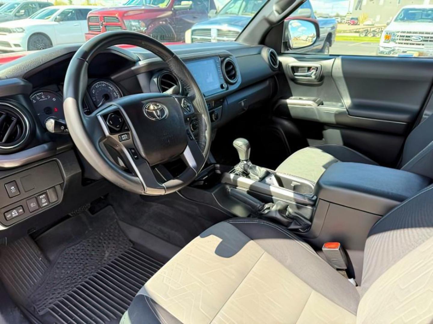 2021 Barcelona Red Metallic /Black/Gun Metal Toyota Tacoma 4WD TRD Off Road (3TMCZ5AN1MM) with an 3.5L V-6 port/direct injection engine, AUTOMATIC transmission, located at 1235 N Woodruff Ave., Idaho Falls, 83401, (208) 523-1053, 43.507172, -112.000488 - At Timberline Auto, finding a great deal on your next vehicle is always easy! Our experienced sales staff's goal is to help find you the right vehicle at the right price! Our knowledgeable finance department has options for almost any credit score. We offer extended service contract options to prote - Photo#11