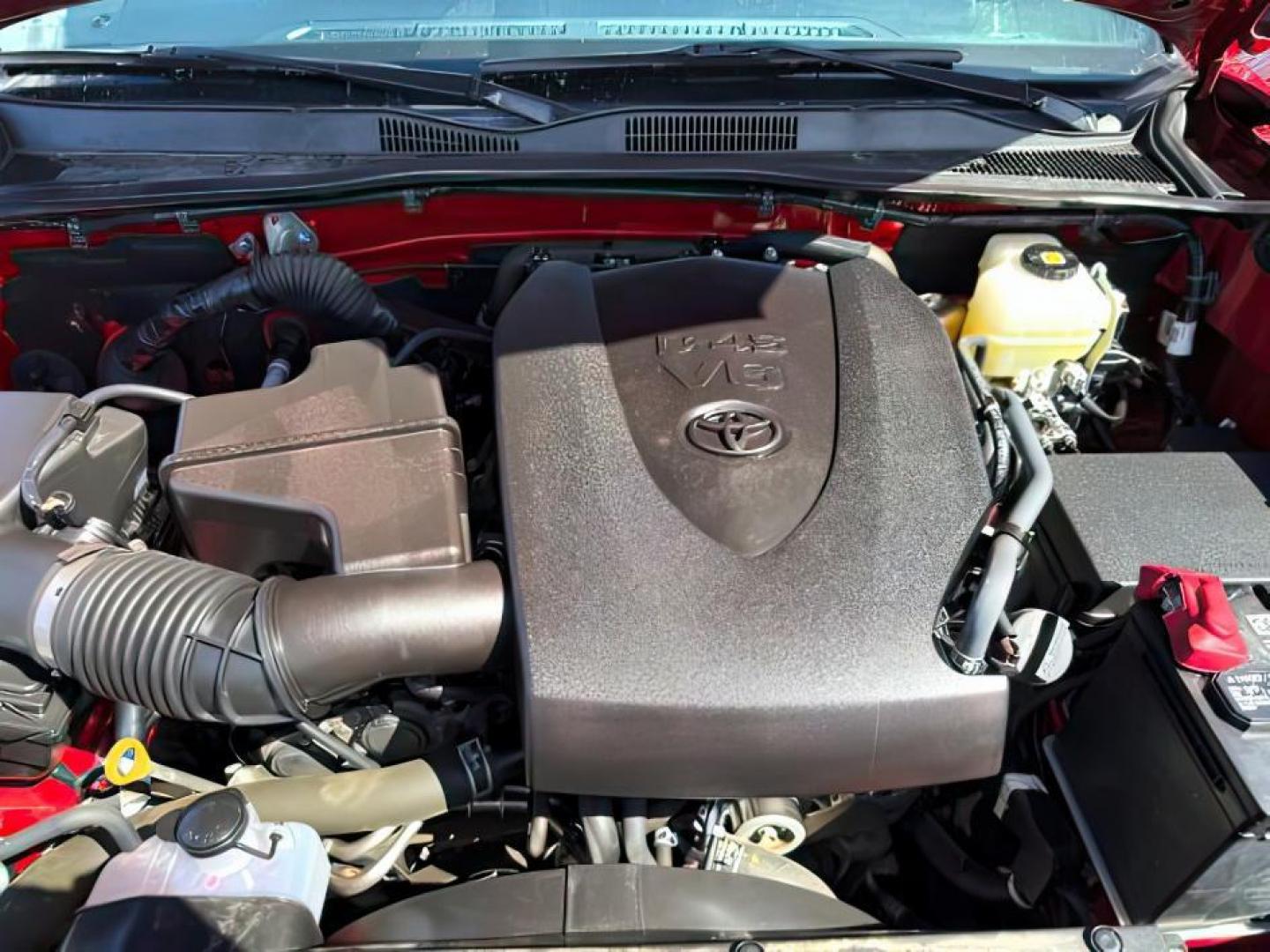 2021 Barcelona Red Metallic /Black/Gun Metal Toyota Tacoma 4WD TRD Off Road (3TMCZ5AN1MM) with an 3.5L V-6 port/direct injection engine, AUTOMATIC transmission, located at 1235 N Woodruff Ave., Idaho Falls, 83401, (208) 523-1053, 43.507172, -112.000488 - At Timberline Auto, finding a great deal on your next vehicle is always easy! Our experienced sales staff's goal is to help find you the right vehicle at the right price! Our knowledgeable finance department has options for almost any credit score. We offer extended service contract options to prote - Photo#21