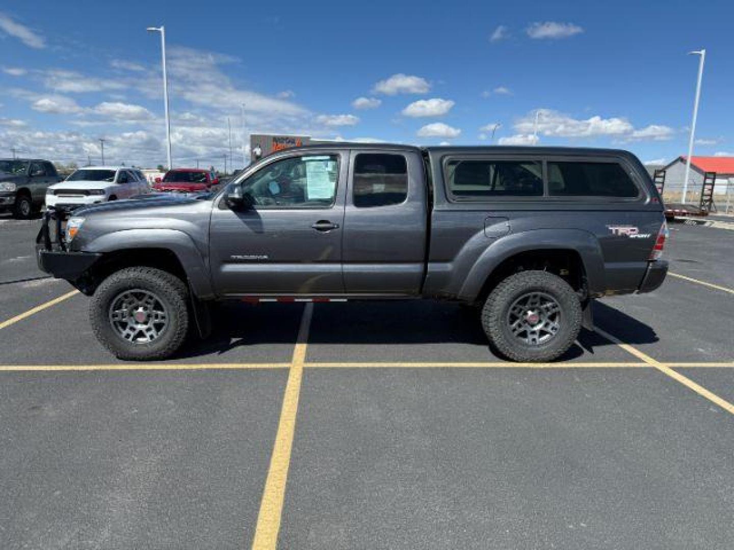 2013 Magnetic Gray Metallic /Graphite Toyota Tacoma Base V6 (5TFUU4EN9DX) with an 4L V-6 DOHC engine, MANUAL transmission, located at 1235 N Woodruff Ave., Idaho Falls, 83401, (208) 523-1053, 43.507172, -112.000488 - At Timberline Auto, finding a great deal on your next vehicle is always easy! Our experienced sales staff's goal is to help find you the right vehicle at the right price! Our knowledgeable finance department has options for almost any credit score. We offer extended service contract options to prote - Photo#1