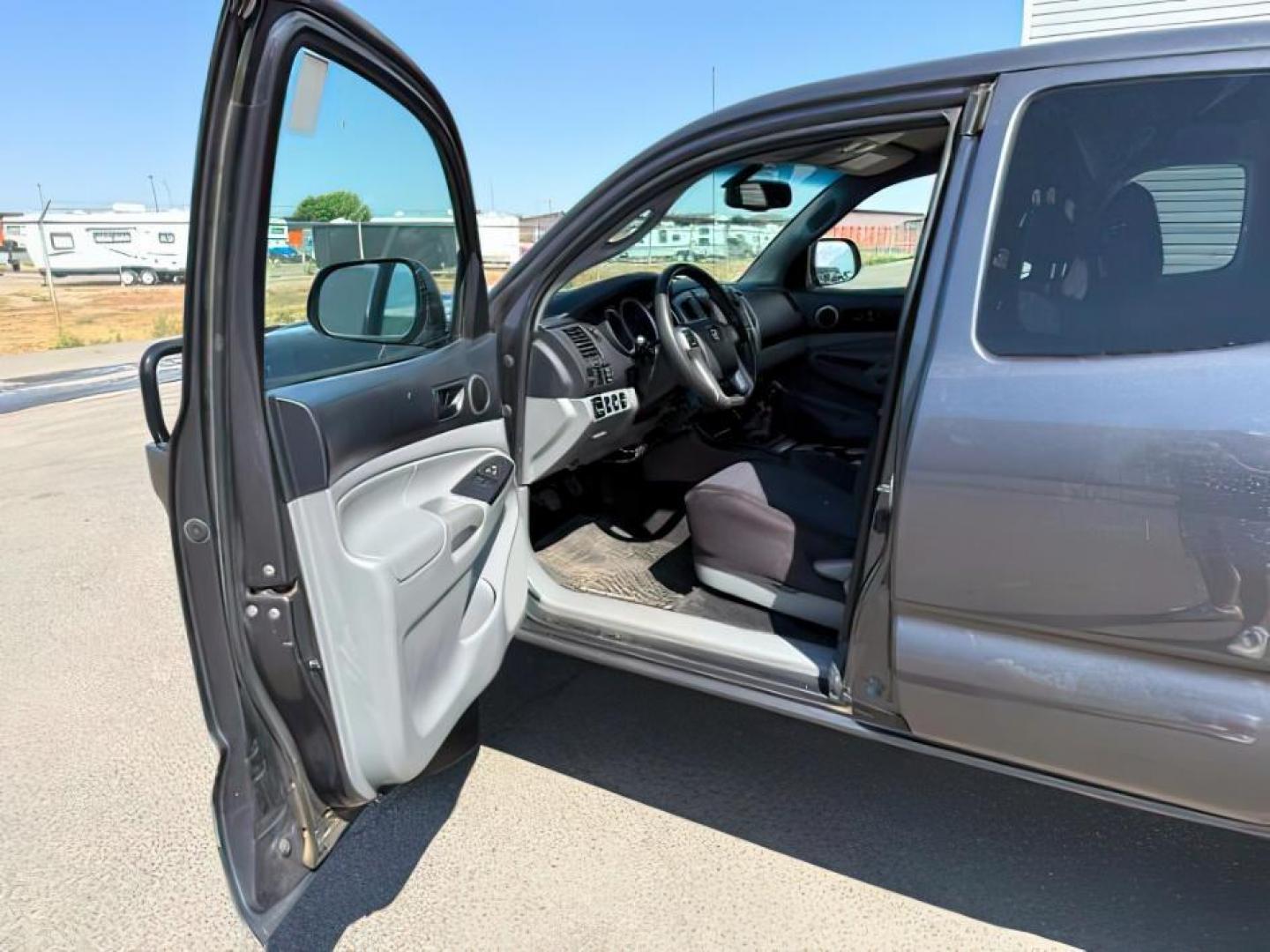 2013 Magnetic Gray Metallic /CLOTH Toyota Tacoma (5TFUU4EN9DX) with an 4L V-6 DOHC engine, Manual transmission, located at 1175 N Woodruff Ave, Idaho Falls, ID, 83401, 43.506901, -111.999657 - At Timberline Auto, finding a great deal on your next vehicle is always easy! Our experienced sales staff's goal is to help find you the right vehicle at the right price! Our knowledgeable finance department has options for almost any credit score. We offer extended service contract options to prote - Photo#9
