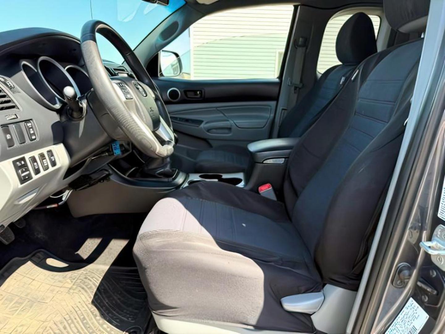 2013 Magnetic Gray Metallic /CLOTH Toyota Tacoma (5TFUU4EN9DX) with an 4L V-6 DOHC engine, Manual transmission, located at 1175 N Woodruff Ave, Idaho Falls, ID, 83401, 43.506901, -111.999657 - At Timberline Auto, finding a great deal on your next vehicle is always easy! Our experienced sales staff's goal is to help find you the right vehicle at the right price! Our knowledgeable finance department has options for almost any credit score. We offer extended service contract options to prote - Photo#10