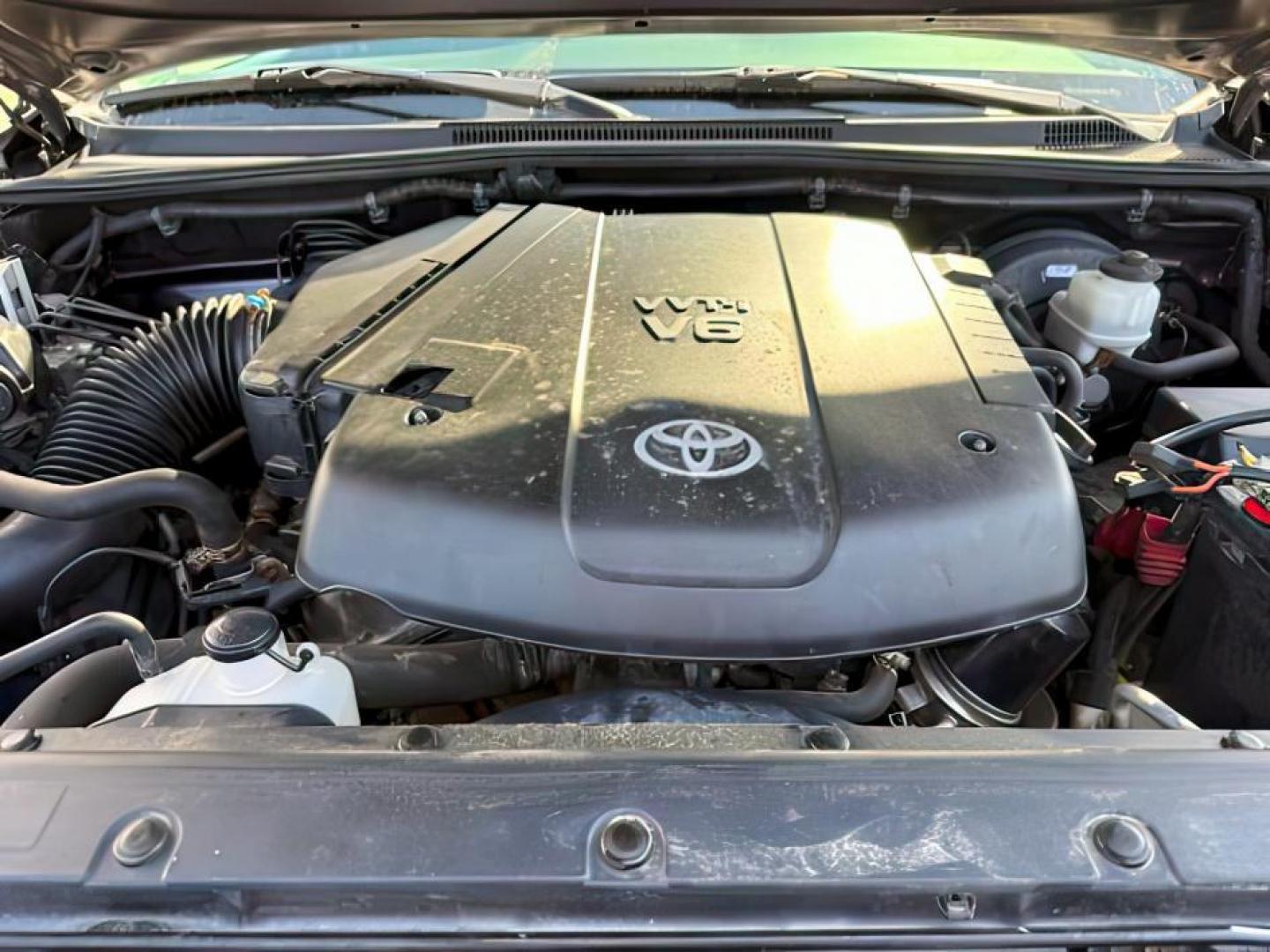 2013 Magnetic Gray Metallic /CLOTH Toyota Tacoma (5TFUU4EN9DX) with an 4L V-6 DOHC engine, Manual transmission, located at 1175 N Woodruff Ave, Idaho Falls, ID, 83401, 43.506901, -111.999657 - At Timberline Auto, finding a great deal on your next vehicle is always easy! Our experienced sales staff's goal is to help find you the right vehicle at the right price! Our knowledgeable finance department has options for almost any credit score. We offer extended service contract options to prote - Photo#18