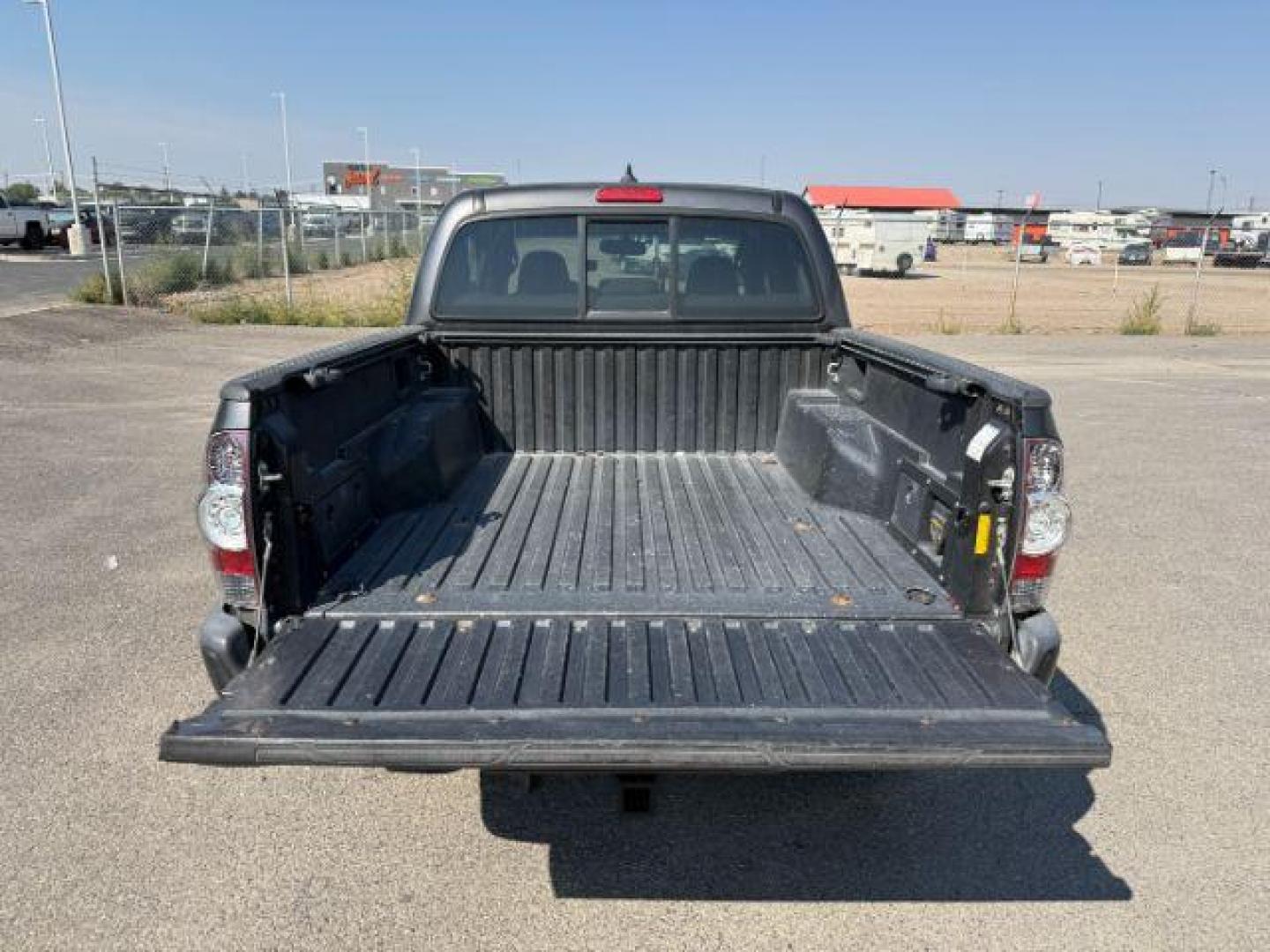 2012 Magnetic Gray Metallic /Graphite Toyota Tacoma (3TMJU4GN1CM) with an 4L V-6 DOHC engine, Automatic transmission, located at 1175 N Woodruff Ave, Idaho Falls, ID, 83401, 43.506901, -111.999657 - At Timberline Auto, finding a great deal on your next vehicle is always easy! Our experienced sales staff's goal is to help find you the right vehicle at the right price! Our knowledgeable finance department has options for almost any credit score. We offer extended service contract options to prote - Photo#27