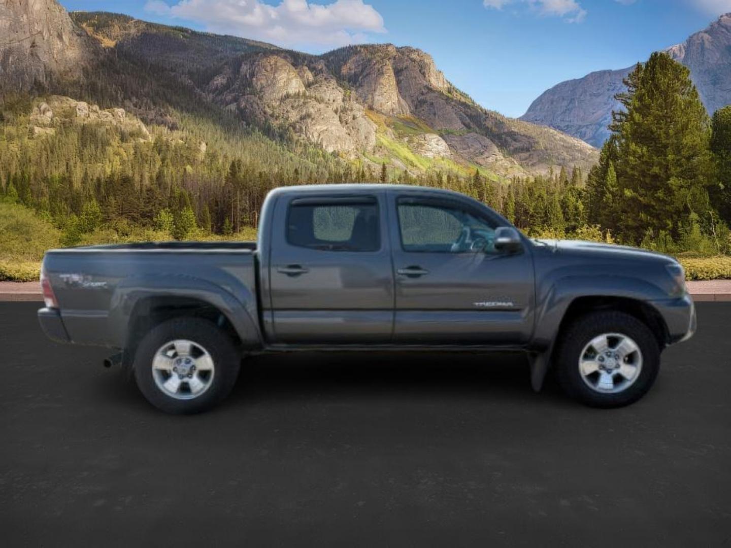2012 Magnetic Gray Metallic /Graphite Toyota Tacoma (3TMJU4GN1CM) with an 4L V-6 DOHC engine, Automatic transmission, located at 1175 N Woodruff Ave, Idaho Falls, ID, 83401, 43.506901, -111.999657 - At Timberline Auto, finding a great deal on your next vehicle is always easy! Our experienced sales staff's goal is to help find you the right vehicle at the right price! Our knowledgeable finance department has options for almost any credit score. We offer extended service contract options to prote - Photo#7
