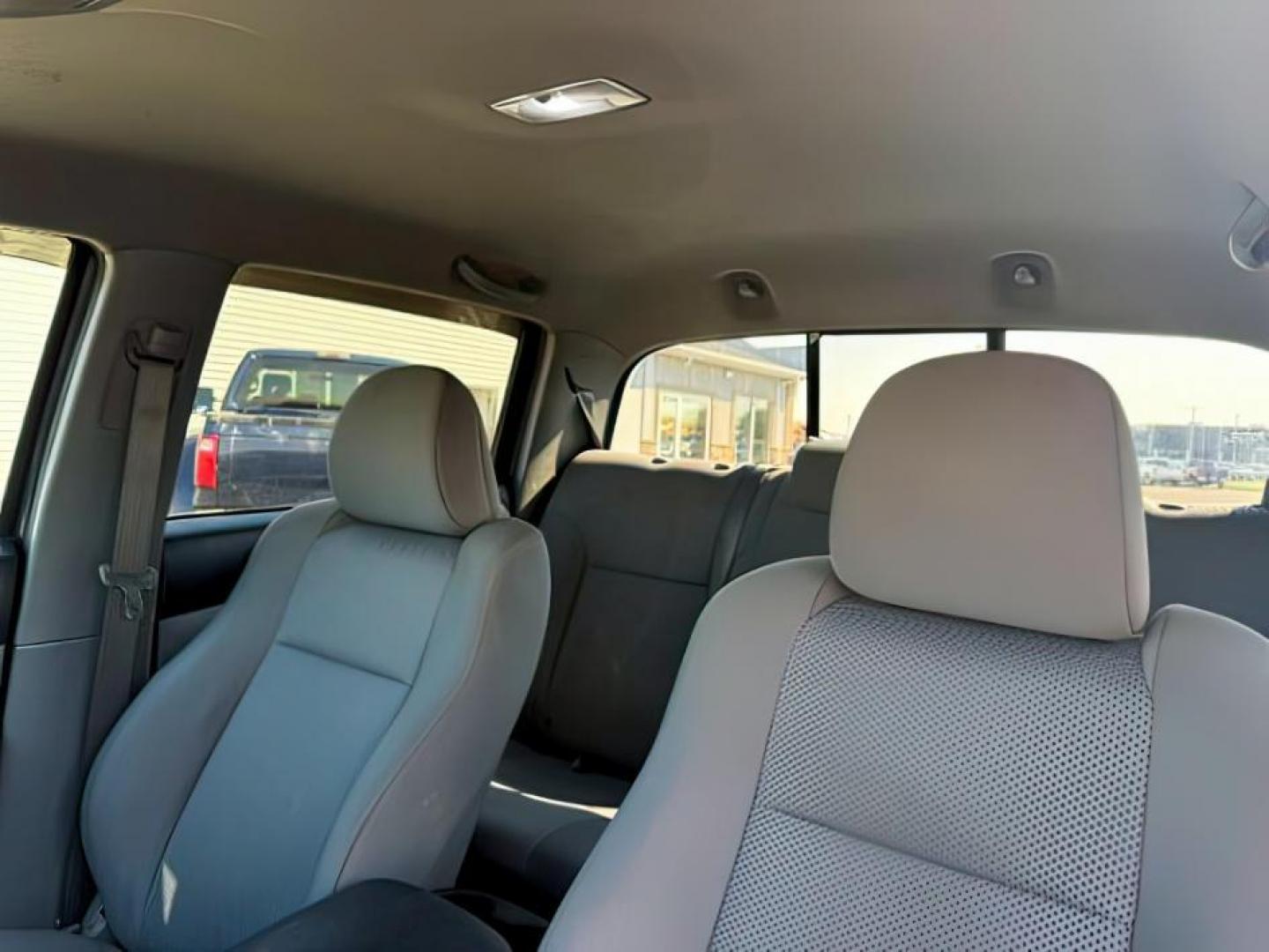 2012 Magnetic Gray Metallic /Graphite Toyota Tacoma (3TMJU4GN1CM) with an 4L V-6 DOHC engine, Automatic transmission, located at 1175 N Woodruff Ave, Idaho Falls, ID, 83401, 43.506901, -111.999657 - At Timberline Auto, finding a great deal on your next vehicle is always easy! Our experienced sales staff's goal is to help find you the right vehicle at the right price! Our knowledgeable finance department has options for almost any credit score. We offer extended service contract options to prote - Photo#17