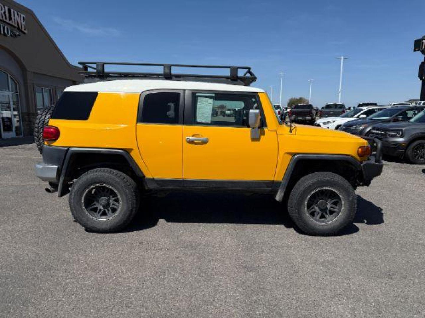 2008 YELLOW /CLOTH Toyota FJ Cruiser UTILITY (JTEBU11F48K) with an V6 4.0L engine, AUTOMATIC transmission, located at 1235 N Woodruff Ave., Idaho Falls, 83401, (208) 523-1053, 43.507172, -112.000488 - At Timberline Auto, finding a great deal on your next vehicle is always easy! Our experienced sales staff's goal is to help find you the right vehicle at the right price! Our knowledgeable finance department has options for almost any credit score. We offer extended service contract options to prote - Photo#0