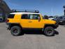 2008 YELLOW /CLOTH Toyota FJ Cruiser UTILITY (JTEBU11F48K) with an V6 4.0L engine, AUTOMATIC transmission, located at 1235 N Woodruff Ave., Idaho Falls, 83401, (208) 523-1053, 43.507172, -112.000488 - At Timberline Auto, finding a great deal on your next vehicle is always easy! Our experienced sales staff's goal is to help find you the right vehicle at the right price! Our knowledgeable finance department has options for almost any credit score. We offer extended service contract options to prote - Photo#0