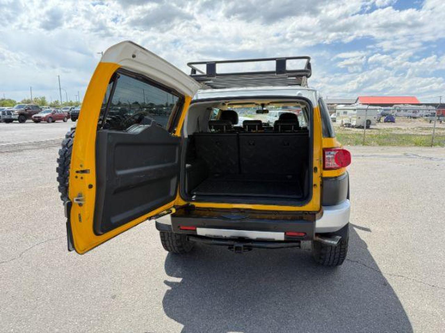 2008 YELLOW /CLOTH Toyota FJ Cruiser UTILITY (JTEBU11F48K) with an V6 4.0L engine, AUTOMATIC transmission, located at 1235 N Woodruff Ave., Idaho Falls, 83401, (208) 523-1053, 43.507172, -112.000488 - At Timberline Auto, finding a great deal on your next vehicle is always easy! Our experienced sales staff's goal is to help find you the right vehicle at the right price! Our knowledgeable finance department has options for almost any credit score. We offer extended service contract options to prote - Photo#4