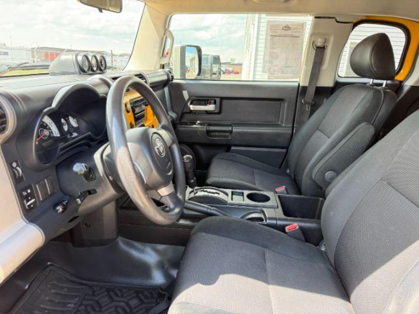 2008 YELLOW /CLOTH Toyota FJ Cruiser UTILITY (JTEBU11F48K) with an V6 4.0L engine, AUTOMATIC transmission, located at 1235 N Woodruff Ave., Idaho Falls, 83401, (208) 523-1053, 43.507172, -112.000488 - At Timberline Auto, finding a great deal on your next vehicle is always easy! Our experienced sales staff's goal is to help find you the right vehicle at the right price! Our knowledgeable finance department has options for almost any credit score. We offer extended service contract options to prote - Photo#10