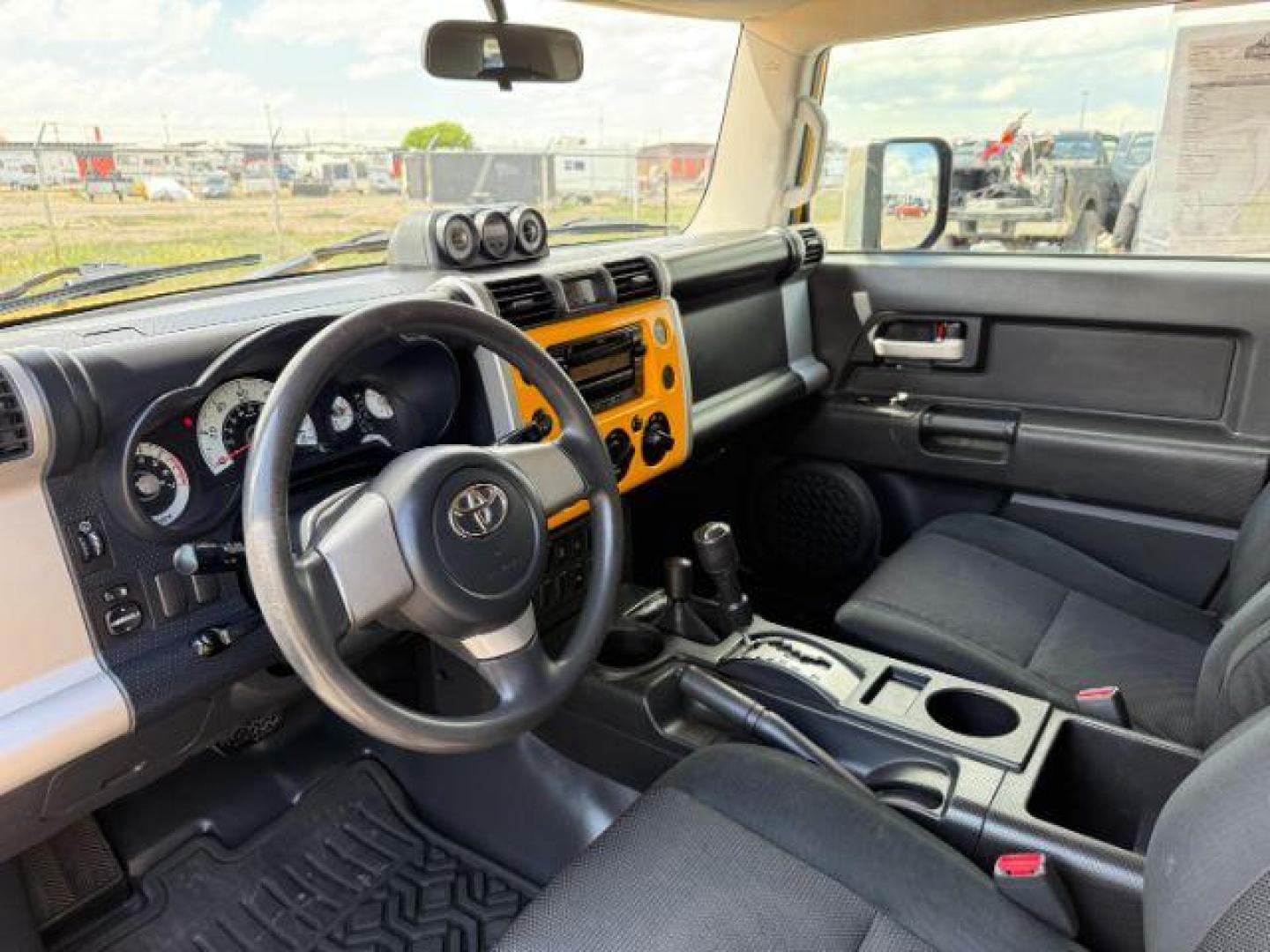 2008 YELLOW /CLOTH Toyota FJ Cruiser UTILITY (JTEBU11F48K) with an V6 4.0L engine, AUTOMATIC transmission, located at 1235 N Woodruff Ave., Idaho Falls, 83401, (208) 523-1053, 43.507172, -112.000488 - At Timberline Auto, finding a great deal on your next vehicle is always easy! Our experienced sales staff's goal is to help find you the right vehicle at the right price! Our knowledgeable finance department has options for almost any credit score. We offer extended service contract options to prote - Photo#11