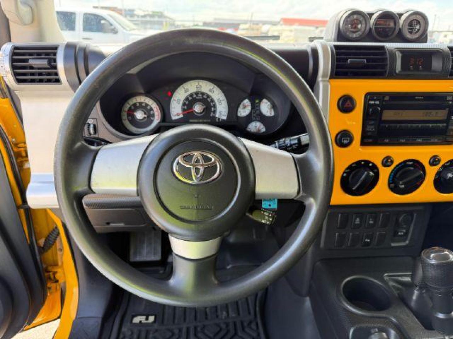 2008 YELLOW /CLOTH Toyota FJ Cruiser UTILITY (JTEBU11F48K) with an V6 4.0L engine, AUTOMATIC transmission, located at 1235 N Woodruff Ave., Idaho Falls, 83401, (208) 523-1053, 43.507172, -112.000488 - At Timberline Auto, finding a great deal on your next vehicle is always easy! Our experienced sales staff's goal is to help find you the right vehicle at the right price! Our knowledgeable finance department has options for almost any credit score. We offer extended service contract options to prote - Photo#12