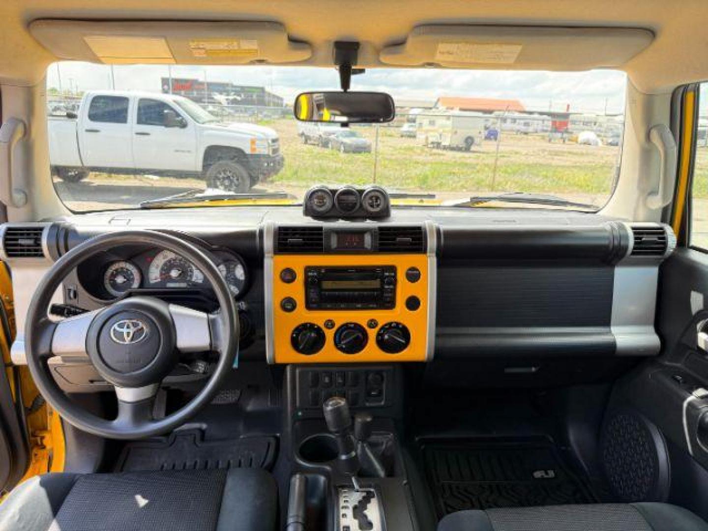 2008 YELLOW /CLOTH Toyota FJ Cruiser UTILITY (JTEBU11F48K) with an V6 4.0L engine, AUTOMATIC transmission, located at 1235 N Woodruff Ave., Idaho Falls, 83401, (208) 523-1053, 43.507172, -112.000488 - At Timberline Auto, finding a great deal on your next vehicle is always easy! Our experienced sales staff's goal is to help find you the right vehicle at the right price! Our knowledgeable finance department has options for almost any credit score. We offer extended service contract options to prote - Photo#17