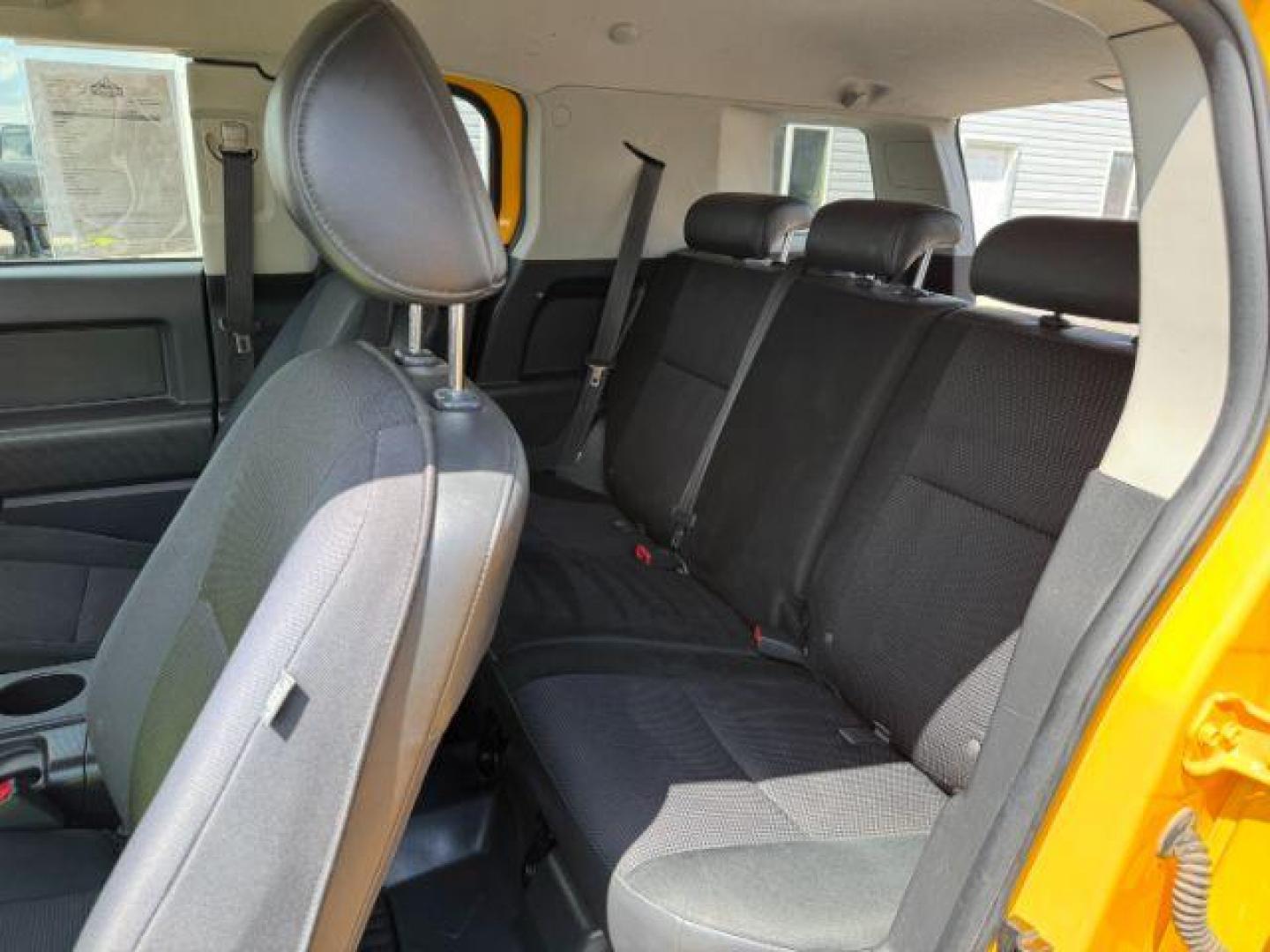 2008 YELLOW /CLOTH Toyota FJ Cruiser UTILITY (JTEBU11F48K) with an V6 4.0L engine, AUTOMATIC transmission, located at 1235 N Woodruff Ave., Idaho Falls, 83401, (208) 523-1053, 43.507172, -112.000488 - At Timberline Auto, finding a great deal on your next vehicle is always easy! Our experienced sales staff's goal is to help find you the right vehicle at the right price! Our knowledgeable finance department has options for almost any credit score. We offer extended service contract options to prote - Photo#18