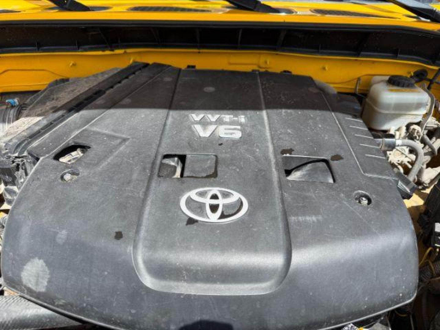 2008 YELLOW /CLOTH Toyota FJ Cruiser UTILITY (JTEBU11F48K) with an V6 4.0L engine, AUTOMATIC transmission, located at 1235 N Woodruff Ave., Idaho Falls, 83401, (208) 523-1053, 43.507172, -112.000488 - At Timberline Auto, finding a great deal on your next vehicle is always easy! Our experienced sales staff's goal is to help find you the right vehicle at the right price! Our knowledgeable finance department has options for almost any credit score. We offer extended service contract options to prote - Photo#19