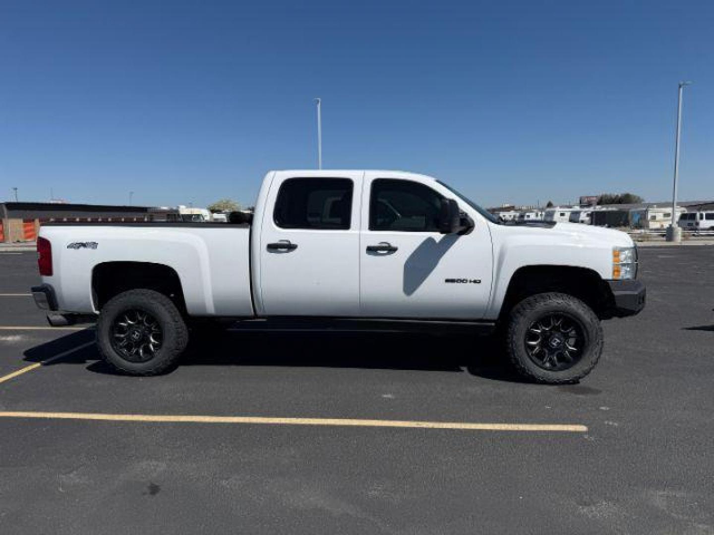 2011 Summit White /Ebony/Dark Titanium Chevrolet Silverado 2500HD Work Truck (1GC1KVC8XBF) with an Duramax 6.6L V-8 diesel direct injection engine, AUTOMATIC transmission, located at 1235 N Woodruff Ave., Idaho Falls, 83401, (208) 523-1053, 43.507172, -112.000488 - At Timberline Auto, finding a great deal on your next vehicle is always easy! Our experienced sales staff's goal is to help find you the right vehicle at the right price! Our knowledgeable finance department has options for almost any credit score. We offer extended service contract options to prote - Photo#0
