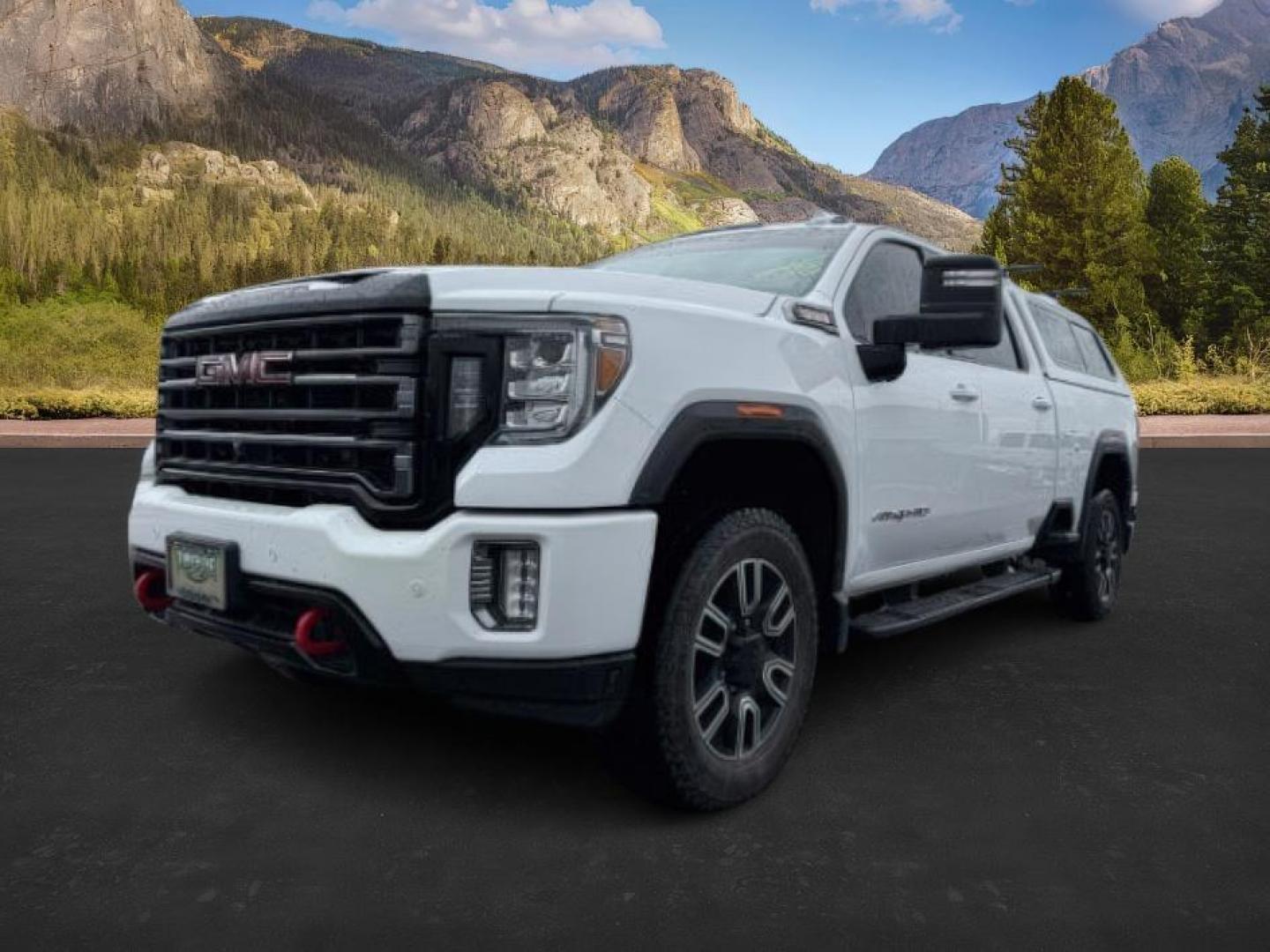 2020 Summit White /Jet Black w/Kalahari Accents GMC Sierra 2500HD 4WD Crew Cab Standard Bed AT4 (1GT49PEY8LF) with an Duramax 6.6L V-8 diesel direct injection engine, AUTOMATIC transmission, located at 1235 N Woodruff Ave., Idaho Falls, 83401, (208) 523-1053, 43.507172, -112.000488 - At Timberline Auto, finding a great deal on your next vehicle is always easy! Our experienced sales staff's goal is to help find you the right vehicle at the right price! Our knowledgeable finance department has options for almost any credit score. We offer extended service contract options to prote - Photo#0