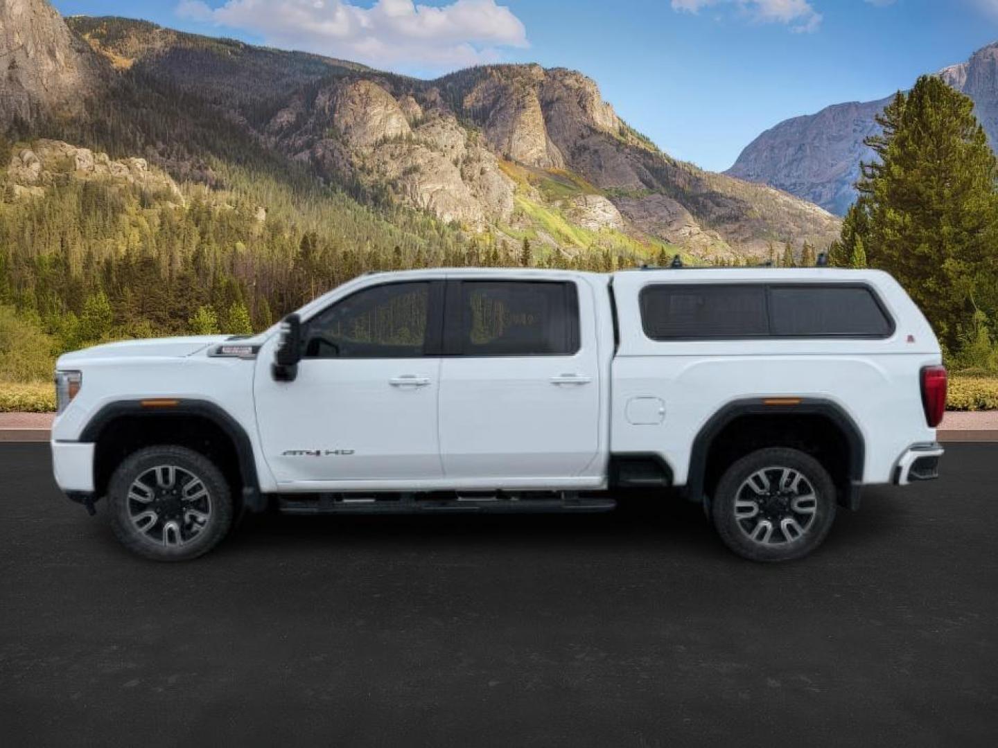 2020 Summit White /Jet Black w/Kalahari Accents GMC Sierra 2500HD 4WD Crew Cab Standard Bed AT4 (1GT49PEY8LF) with an Duramax 6.6L V-8 diesel direct injection engine, AUTOMATIC transmission, located at 1235 N Woodruff Ave., Idaho Falls, 83401, (208) 523-1053, 43.507172, -112.000488 - At Timberline Auto, finding a great deal on your next vehicle is always easy! Our experienced sales staff's goal is to help find you the right vehicle at the right price! Our knowledgeable finance department has options for almost any credit score. We offer extended service contract options to prote - Photo#1