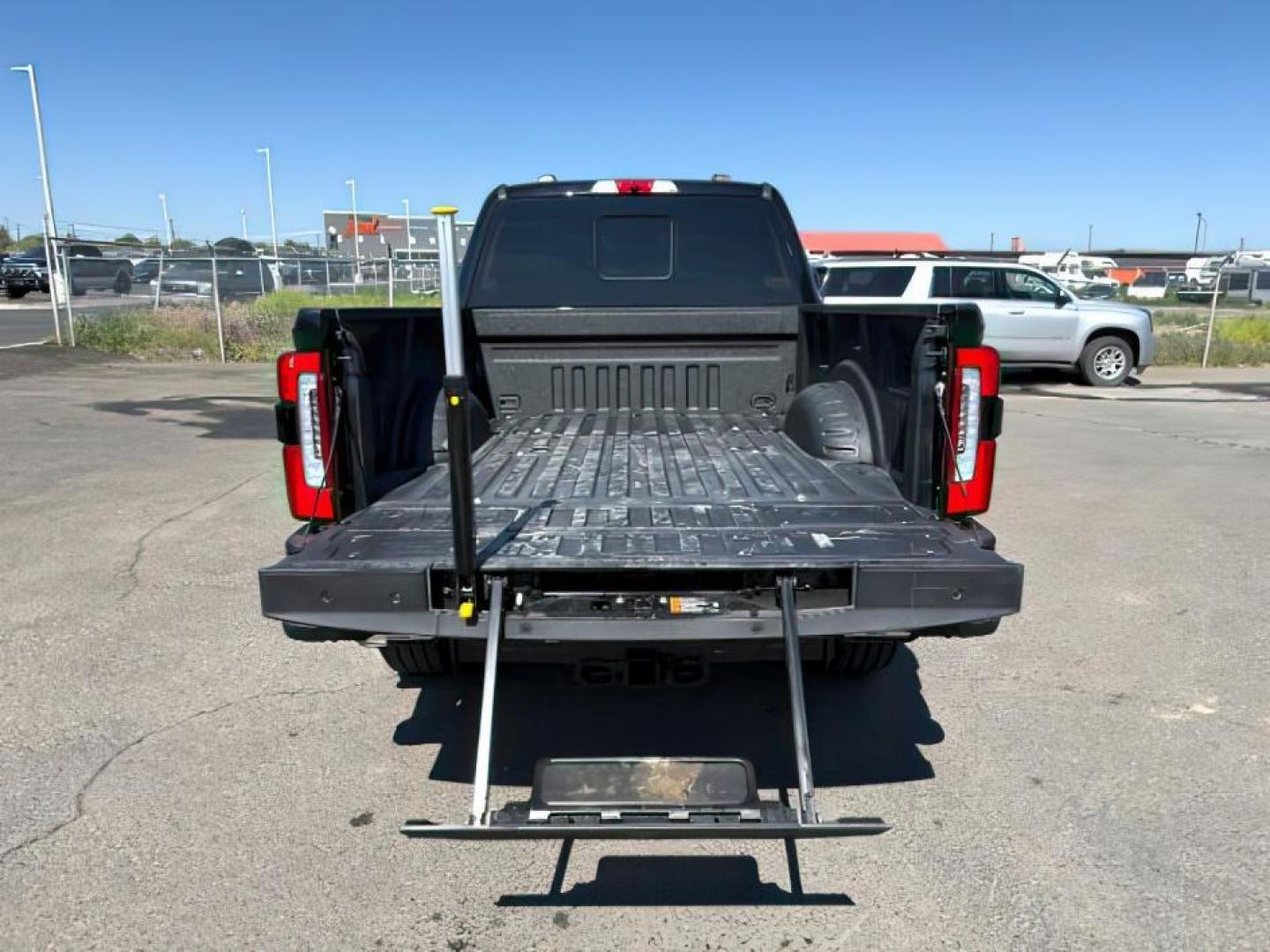 2024 Agate Black Metallic /Black Onyx Ford F-350 Platinum (1FT8W3BT7RE) with an Powerstroke 6.7L V-8 diesel direct injection engine, AUTOMATIC transmission, located at 1235 N Woodruff Ave., Idaho Falls, 83401, (208) 523-1053, 43.507172, -112.000488 - At Timberline Auto, finding a great deal on your next vehicle is always easy! Our experienced sales staff's goal is to help find you the right vehicle at the right price! Our knowledgeable finance department has options for almost any credit score. We offer extended service contract options to prote - Photo#5