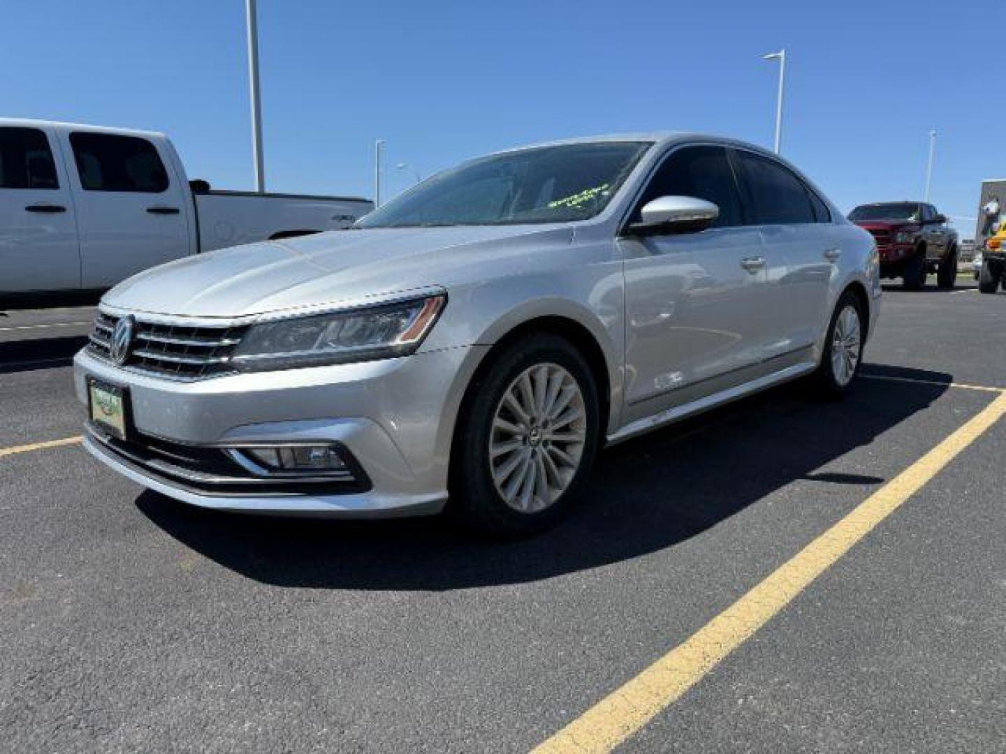 2016 Reflex Silver Metallic /Titan Black Volkswagen Passat 1.8T SE (1VWBT7A37GC) with an 1.8L I-4 gasoline direct injection engine, AUTOMATIC transmission, located at 1235 N Woodruff Ave., Idaho Falls, 83401, (208) 523-1053, 43.507172, -112.000488 - At Timberline Auto, finding a great deal on your next vehicle is always easy! Our experienced sales staff's goal is to help find you the right vehicle at the right price! Our knowledgeable finance department has options for almost any credit score. We offer extended service contract options to prote - Photo#0