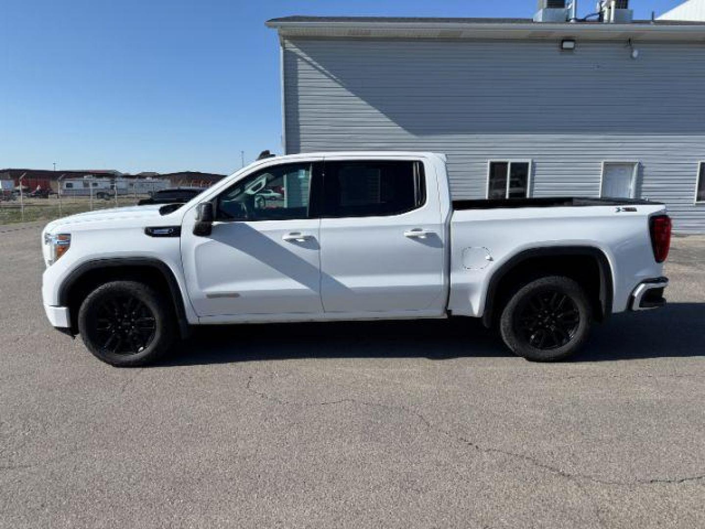 2021 Summit White /Jet Black GMC Sierra 1500 4WD Crew Cab Short Box Elevation (3GTU9CET8MG) with an Duramax 3L I-6 diesel direct injection engine, AUTOMATIC transmission, located at 1235 N Woodruff Ave., Idaho Falls, 83401, (208) 523-1053, 43.507172, -112.000488 - At Timberline Auto, finding a great deal on your next vehicle is always easy! Our experienced sales staff's goal is to help find you the right vehicle at the right price! Our knowledgeable finance department has options for almost any credit score. We offer extended service contract options to prote - Photo#1