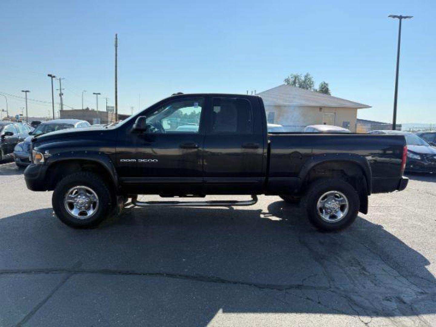 2005 BLACK /LEATHER Dodge Ram 3500 (3D7LS38CX5G) with an 59 engine, Automatic transmission, located at 1175 N Woodruff Ave, Idaho Falls, ID, 83401, 43.506901, -111.999657 - At Timberline Auto, finding a great deal on your next vehicle is always easy! Our experienced sales staff's goal is to help find you the right vehicle at the right price! Our knowledgeable finance department has options for almost any credit score. We offer extended service contract options to prote - Photo#22