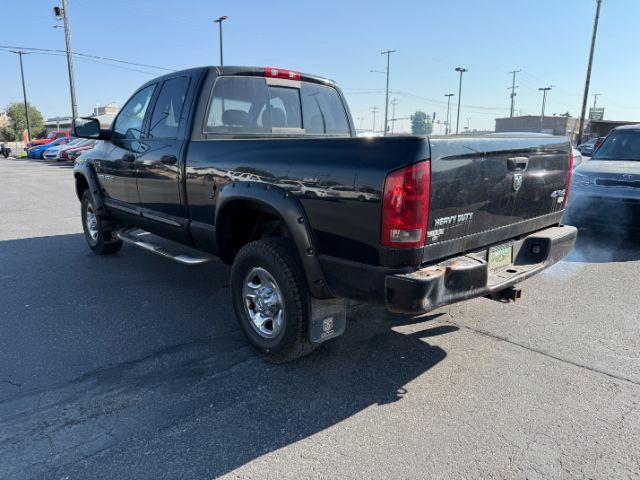 2005 BLACK /LEATHER Dodge Ram 3500 Laramie Quad Cab Short Bed 4WD (3D7LS38CX5G) with an 5.9 engine, AUTOMATIC transmission, located at 1235 N Woodruff Ave., Idaho Falls, 83401, (208) 523-1053, 43.507172, -112.000488 - 2005 Dodge Ram 3500 powered by the legendary 5.9L Cummins turbo-diesel engine. Built for serious towing, hauling, and long-term durability, this one-ton truck delivers the capability that made Cummins-powered Rams so sought after. Equipped with 4WD and an automatic transmission, it offers confident- Photo#23