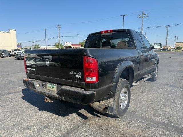 2005 BLACK /LEATHER Dodge Ram 3500 Laramie Quad Cab Short Bed 4WD (3D7LS38CX5G) with an 5.9 engine, AUTOMATIC transmission, located at 1235 N Woodruff Ave., Idaho Falls, 83401, (208) 523-1053, 43.507172, -112.000488 - 2005 Dodge Ram 3500 powered by the legendary 5.9L Cummins turbo-diesel engine. Built for serious towing, hauling, and long-term durability, this one-ton truck delivers the capability that made Cummins-powered Rams so sought after. Equipped with 4WD and an automatic transmission, it offers confident- Photo#26