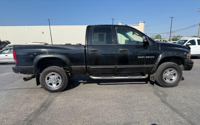 2005 BLACK /LEATHER Dodge Ram 3500 Laramie Quad Cab Short Bed 4WD (3D7LS38CX5G) with an 5.9 engine, AUTOMATIC transmission, located at 1235 N Woodruff Ave., Idaho Falls, 83401, (208) 523-1053, 43.507172, -112.000488 - 2005 Dodge Ram 3500 powered by the legendary 5.9L Cummins turbo-diesel engine. Built for serious towing, hauling, and long-term durability, this one-ton truck delivers the capability that made Cummins-powered Rams so sought after. Equipped with 4WD and an automatic transmission, it offers confident- Photo#27