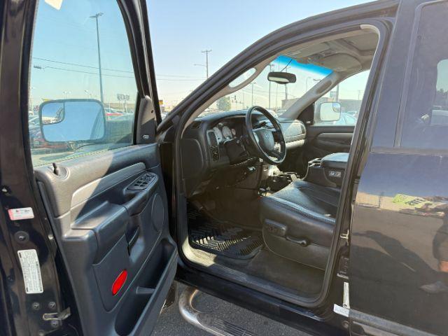2005 BLACK /LEATHER Dodge Ram 3500 Laramie Quad Cab Short Bed 4WD (3D7LS38CX5G) with an 5.9 engine, AUTOMATIC transmission, located at 1235 N Woodruff Ave., Idaho Falls, 83401, (208) 523-1053, 43.507172, -112.000488 - 2005 Dodge Ram 3500 powered by the legendary 5.9L Cummins turbo-diesel engine. Built for serious towing, hauling, and long-term durability, this one-ton truck delivers the capability that made Cummins-powered Rams so sought after. Equipped with 4WD and an automatic transmission, it offers confident- Photo#31