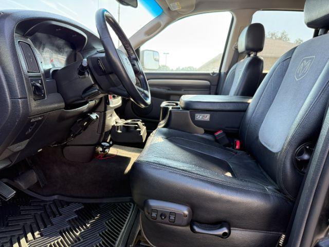 2005 BLACK /LEATHER Dodge Ram 3500 Laramie Quad Cab Short Bed 4WD (3D7LS38CX5G) with an 5.9 engine, AUTOMATIC transmission, located at 1235 N Woodruff Ave., Idaho Falls, 83401, (208) 523-1053, 43.507172, -112.000488 - 2005 Dodge Ram 3500 powered by the legendary 5.9L Cummins turbo-diesel engine. Built for serious towing, hauling, and long-term durability, this one-ton truck delivers the capability that made Cummins-powered Rams so sought after. Equipped with 4WD and an automatic transmission, it offers confident- Photo#32