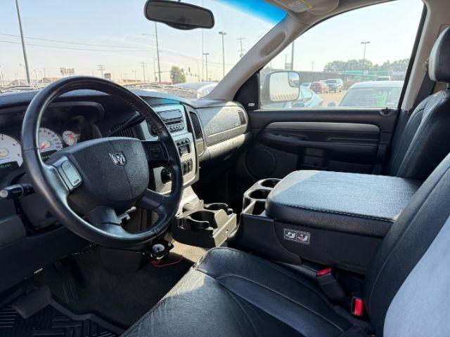 2005 BLACK /LEATHER Dodge Ram 3500 Laramie Quad Cab Short Bed 4WD (3D7LS38CX5G) with an 5.9 engine, AUTOMATIC transmission, located at 1235 N Woodruff Ave., Idaho Falls, 83401, (208) 523-1053, 43.507172, -112.000488 - 2005 Dodge Ram 3500 powered by the legendary 5.9L Cummins turbo-diesel engine. Built for serious towing, hauling, and long-term durability, this one-ton truck delivers the capability that made Cummins-powered Rams so sought after. Equipped with 4WD and an automatic transmission, it offers confident- Photo#33
