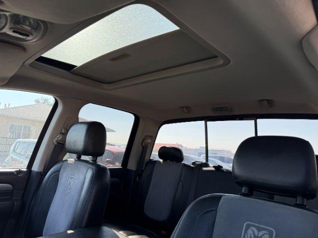 2005 BLACK /LEATHER Dodge Ram 3500 Laramie Quad Cab Short Bed 4WD (3D7LS38CX5G) with an 5.9 engine, AUTOMATIC transmission, located at 1235 N Woodruff Ave., Idaho Falls, 83401, (208) 523-1053, 43.507172, -112.000488 - 2005 Dodge Ram 3500 powered by the legendary 5.9L Cummins turbo-diesel engine. Built for serious towing, hauling, and long-term durability, this one-ton truck delivers the capability that made Cummins-powered Rams so sought after. Equipped with 4WD and an automatic transmission, it offers confident- Photo#37