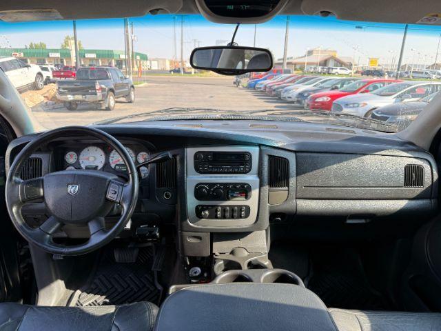 2005 BLACK /LEATHER Dodge Ram 3500 Laramie Quad Cab Short Bed 4WD (3D7LS38CX5G) with an 5.9 engine, AUTOMATIC transmission, located at 1235 N Woodruff Ave., Idaho Falls, 83401, (208) 523-1053, 43.507172, -112.000488 - 2005 Dodge Ram 3500 powered by the legendary 5.9L Cummins turbo-diesel engine. Built for serious towing, hauling, and long-term durability, this one-ton truck delivers the capability that made Cummins-powered Rams so sought after. Equipped with 4WD and an automatic transmission, it offers confident- Photo#39