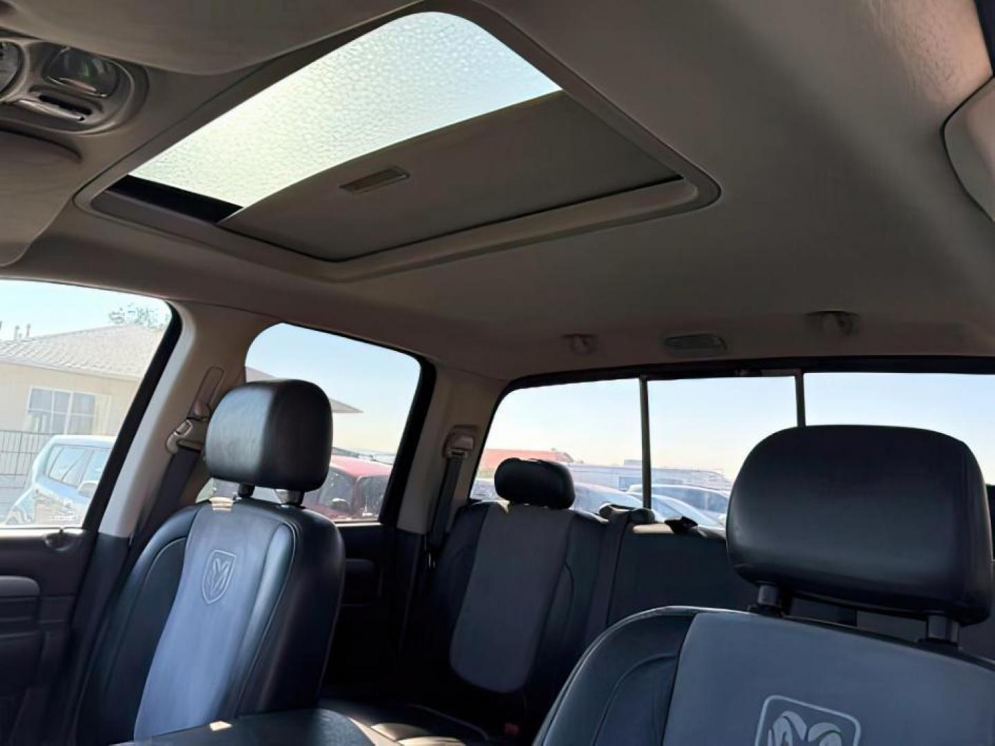 2005 BLACK /LEATHER Dodge Ram 3500 (3D7LS38CX5G) with an 59 engine, Automatic transmission, located at 1175 N Woodruff Ave, Idaho Falls, ID, 83401, 43.506901, -111.999657 - At Timberline Auto, finding a great deal on your next vehicle is always easy! Our experienced sales staff's goal is to help find you the right vehicle at the right price! Our knowledgeable finance department has options for almost any credit score. We offer extended service contract options to prote - Photo#16