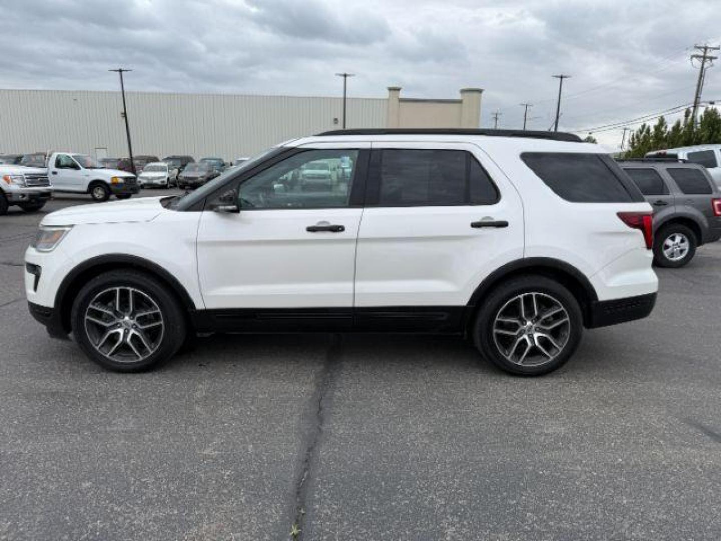 2019 WHITE /Ebony Black w/Red Accent Stitching Ford Explorer Sport (1FM5K8GT0KG) with an EcoBoost 3.5L V-6 gasoline direct injection engine, AUTOMATIC transmission, located at 1235 N Woodruff Ave., Idaho Falls, 83401, (208) 523-1053, 43.507172, -112.000488 - At Timberline Auto, finding a great deal on your next vehicle is always easy! Our experienced sales staff's goal is to help find you the right vehicle at the right price! Our knowledgeable finance department has options for almost any credit score. We offer extended service contract options to prote - Photo#1