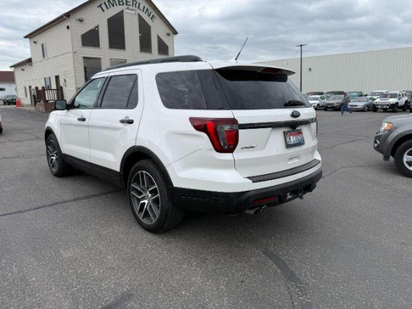 2019 WHITE /Ebony Black w/Red Accent Stitching Ford Explorer Sport (1FM5K8GT0KG) with an EcoBoost 3.5L V-6 gasoline direct injection engine, AUTOMATIC transmission, located at 1235 N Woodruff Ave., Idaho Falls, 83401, (208) 523-1053, 43.507172, -112.000488 - At Timberline Auto, finding a great deal on your next vehicle is always easy! Our experienced sales staff's goal is to help find you the right vehicle at the right price! Our knowledgeable finance department has options for almost any credit score. We offer extended service contract options to prote - Photo#2