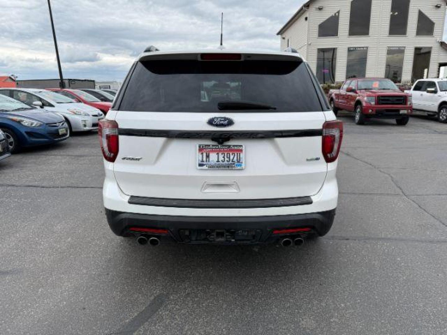 2019 WHITE /Ebony Black w/Red Accent Stitching Ford Explorer Sport (1FM5K8GT0KG) with an EcoBoost 3.5L V-6 gasoline direct injection engine, AUTOMATIC transmission, located at 1235 N Woodruff Ave., Idaho Falls, 83401, (208) 523-1053, 43.507172, -112.000488 - At Timberline Auto, finding a great deal on your next vehicle is always easy! Our experienced sales staff's goal is to help find you the right vehicle at the right price! Our knowledgeable finance department has options for almost any credit score. We offer extended service contract options to prote - Photo#3
