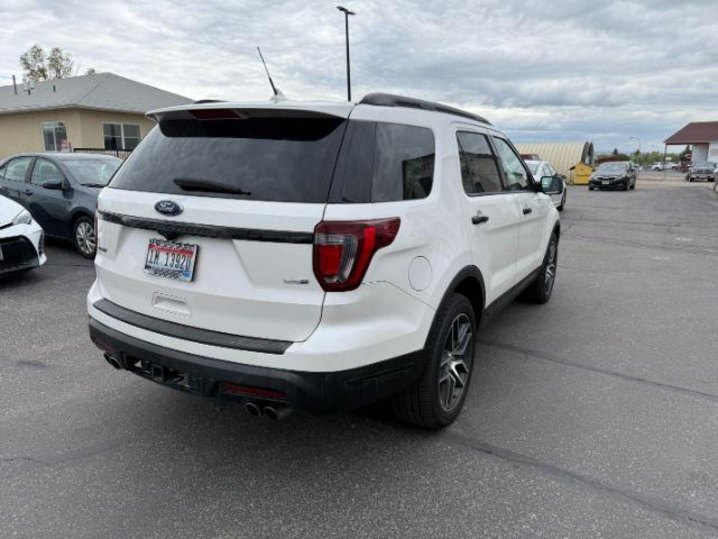 2019 WHITE /Ebony Black w/Red Accent Stitching Ford Explorer Sport (1FM5K8GT0KG) with an EcoBoost 3.5L V-6 gasoline direct injection engine, AUTOMATIC transmission, located at 1235 N Woodruff Ave., Idaho Falls, 83401, (208) 523-1053, 43.507172, -112.000488 - At Timberline Auto, finding a great deal on your next vehicle is always easy! Our experienced sales staff's goal is to help find you the right vehicle at the right price! Our knowledgeable finance department has options for almost any credit score. We offer extended service contract options to prote - Photo#6
