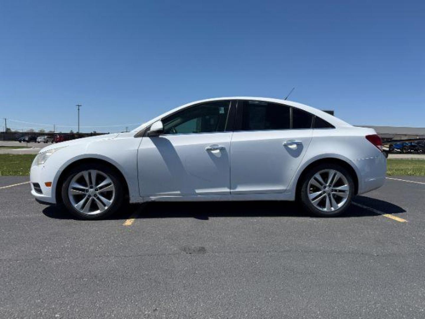 2011 Summit White /Jet Black Chevrolet Cruze LTZ (1G1PH5S96B7) with an Ecotec 1.4L I-4 DOHC engine, AUTOMATIC transmission, located at 1235 N Woodruff Ave., Idaho Falls, 83401, (208) 523-1053, 43.507172, -112.000488 - At Timberline Auto, finding a great deal on your next vehicle is always easy! Our experienced sales staff's goal is to help find you the right vehicle at the right price! Our knowledgeable finance department has options for almost any credit score. We offer extended service contract options to prote - Photo#0