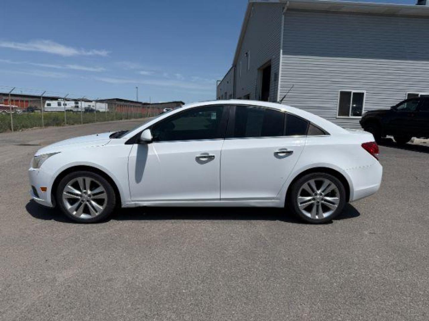 2011 Summit White /Jet Black Chevrolet Cruze LTZ (1G1PH5S96B7) with an Ecotec 1.4L I-4 DOHC engine, AUTOMATIC transmission, located at 1235 N Woodruff Ave., Idaho Falls, 83401, (208) 523-1053, 43.507172, -112.000488 - At Timberline Auto, finding a great deal on your next vehicle is always easy! Our experienced sales staff's goal is to help find you the right vehicle at the right price! Our knowledgeable finance department has options for almost any credit score. We offer extended service contract options to prote - Photo#1