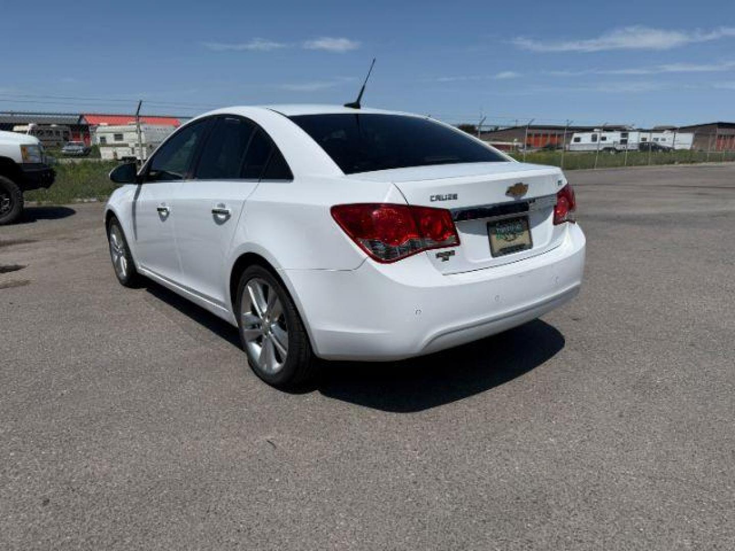 2011 Summit White /Jet Black Chevrolet Cruze LTZ (1G1PH5S96B7) with an Ecotec 1.4L I-4 DOHC engine, AUTOMATIC transmission, located at 1235 N Woodruff Ave., Idaho Falls, 83401, (208) 523-1053, 43.507172, -112.000488 - At Timberline Auto, finding a great deal on your next vehicle is always easy! Our experienced sales staff's goal is to help find you the right vehicle at the right price! Our knowledgeable finance department has options for almost any credit score. We offer extended service contract options to prote - Photo#2
