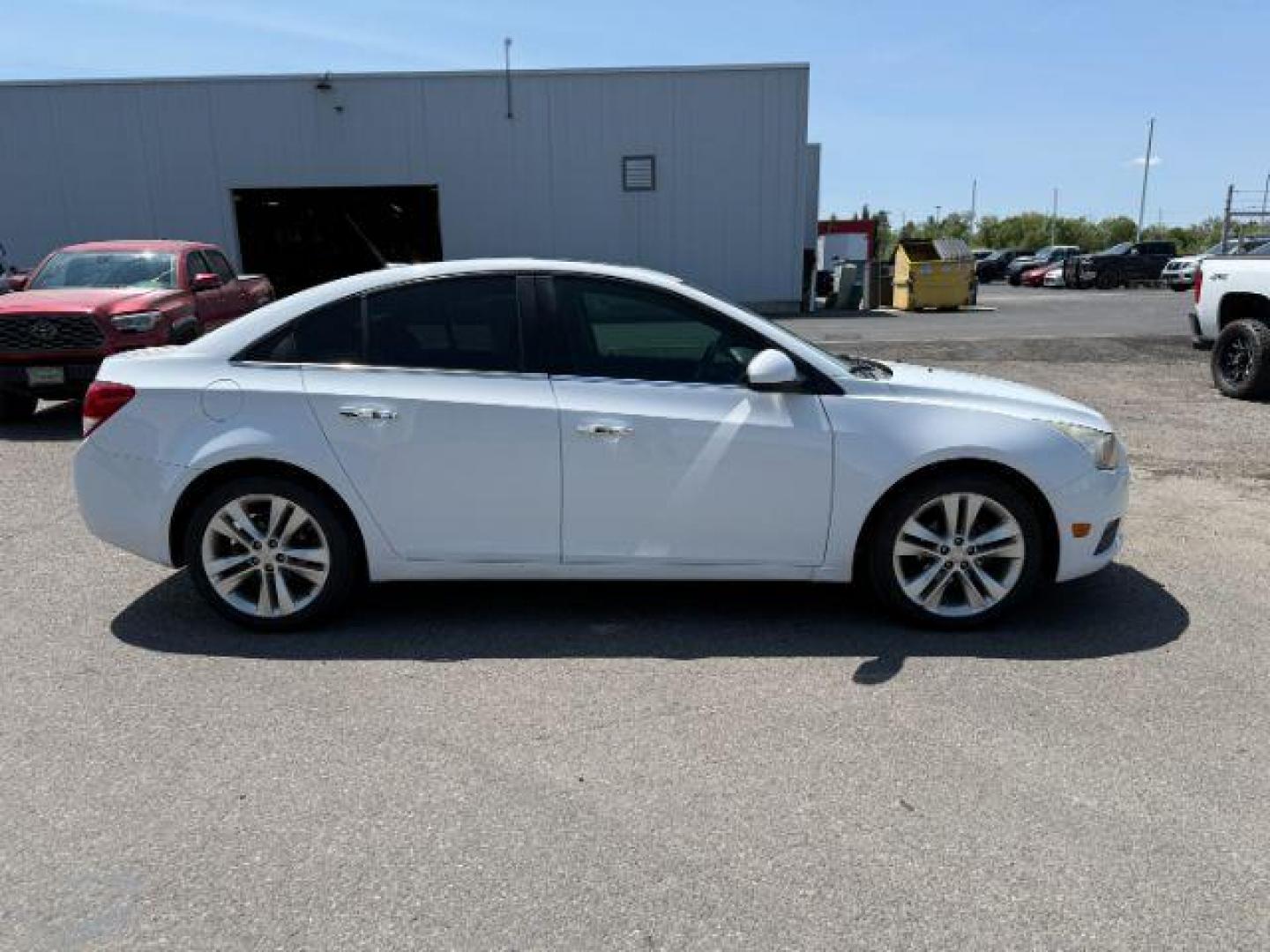 2011 Summit White /Jet Black Chevrolet Cruze LTZ (1G1PH5S96B7) with an Ecotec 1.4L I-4 DOHC engine, AUTOMATIC transmission, located at 1235 N Woodruff Ave., Idaho Falls, 83401, (208) 523-1053, 43.507172, -112.000488 - At Timberline Auto, finding a great deal on your next vehicle is always easy! Our experienced sales staff's goal is to help find you the right vehicle at the right price! Our knowledgeable finance department has options for almost any credit score. We offer extended service contract options to prote - Photo#5