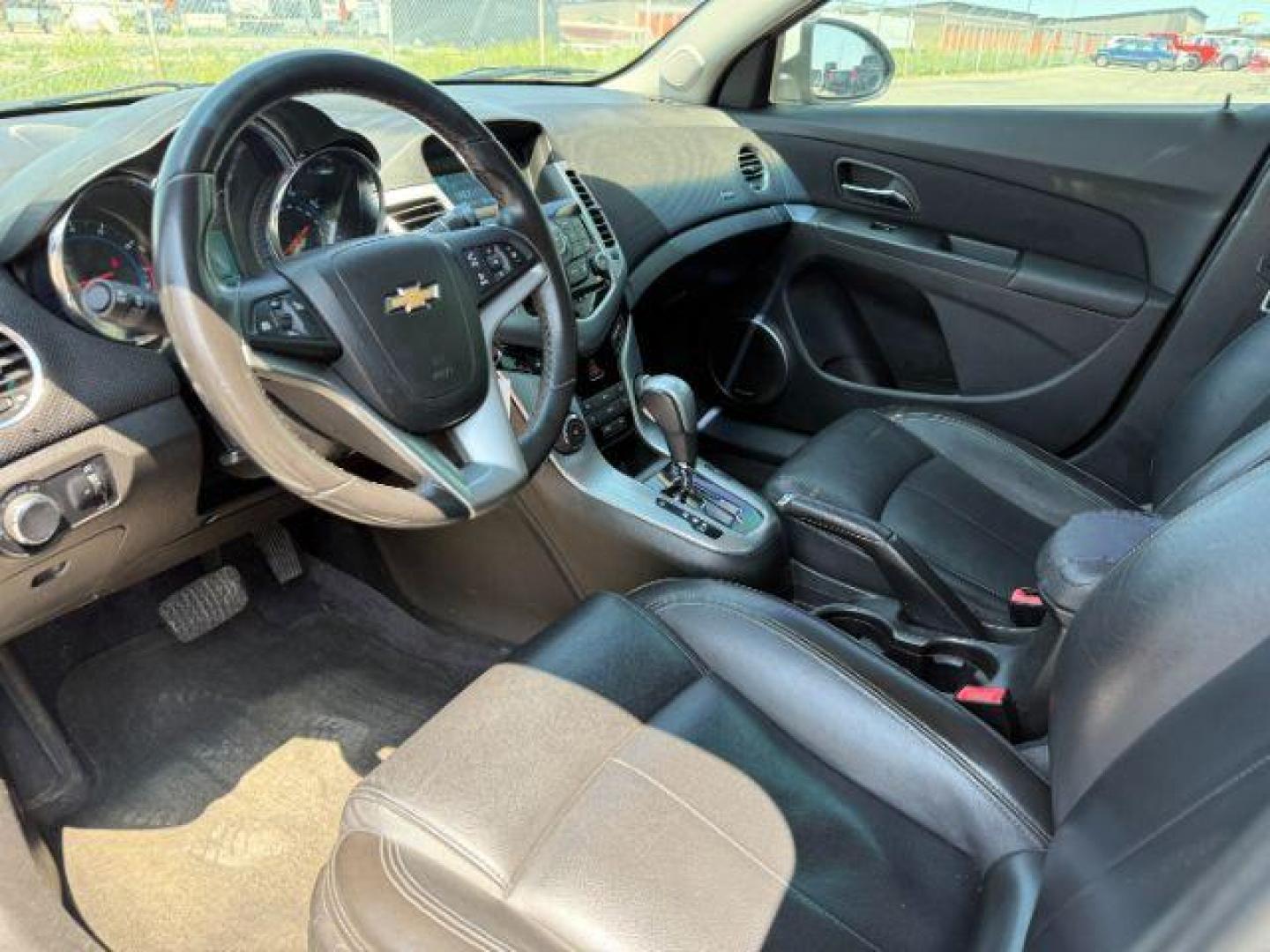 2011 Summit White /Jet Black Chevrolet Cruze LTZ (1G1PH5S96B7) with an Ecotec 1.4L I-4 DOHC engine, AUTOMATIC transmission, located at 1235 N Woodruff Ave., Idaho Falls, 83401, (208) 523-1053, 43.507172, -112.000488 - At Timberline Auto, finding a great deal on your next vehicle is always easy! Our experienced sales staff's goal is to help find you the right vehicle at the right price! Our knowledgeable finance department has options for almost any credit score. We offer extended service contract options to prote - Photo#10