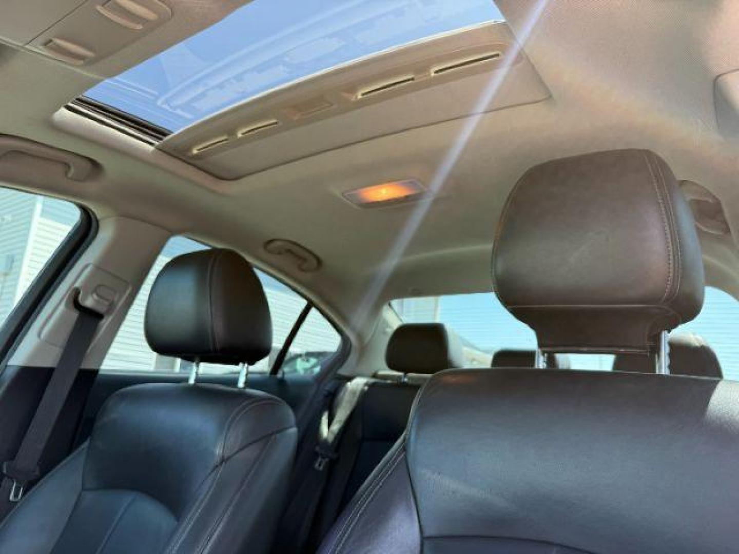 2011 Summit White /Jet Black Chevrolet Cruze LTZ (1G1PH5S96B7) with an Ecotec 1.4L I-4 DOHC engine, AUTOMATIC transmission, located at 1235 N Woodruff Ave., Idaho Falls, 83401, (208) 523-1053, 43.507172, -112.000488 - At Timberline Auto, finding a great deal on your next vehicle is always easy! Our experienced sales staff's goal is to help find you the right vehicle at the right price! Our knowledgeable finance department has options for almost any credit score. We offer extended service contract options to prote - Photo#14
